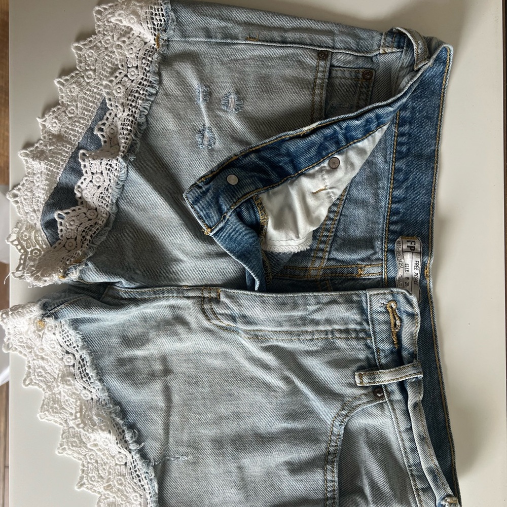 Free people light wash denim shorts